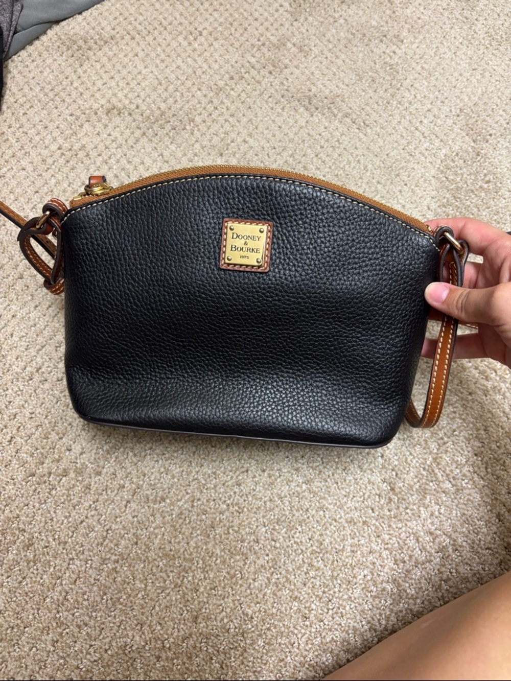 Dooney & Bourke Black with Tan Trim Pebbled Leather Crossbody